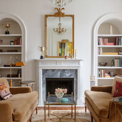 Living room - traditional medium tone wood floor living room idea in Philadelphia with white walls, a standard fireplace, a stone fireplace and no tv