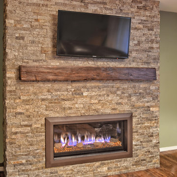 Stacked stone linear fireplace