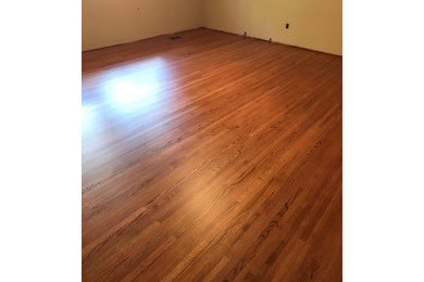 Mid-sized elegant formal and open concept light wood floor and brown floor living room photo in Phoenix