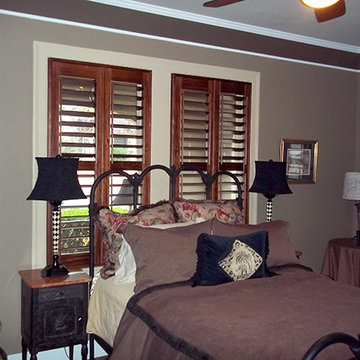 Stained Shutters on White Casement Windows