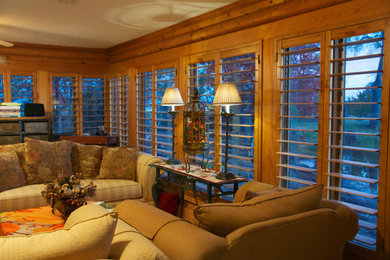 Example of a mountain style living room design in Omaha