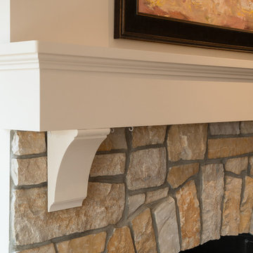 Stone Fireplace with White Mantle and Corbels