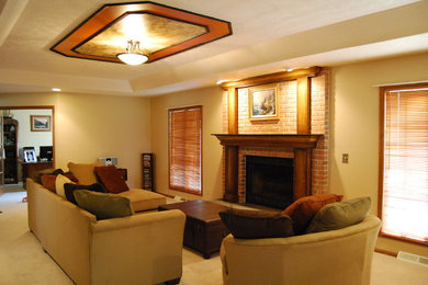 Inspiration for a medium sized traditional formal enclosed living room in Cleveland with beige walls, carpet, a standard fireplace, a brick fireplace surround, no tv and beige floors.
