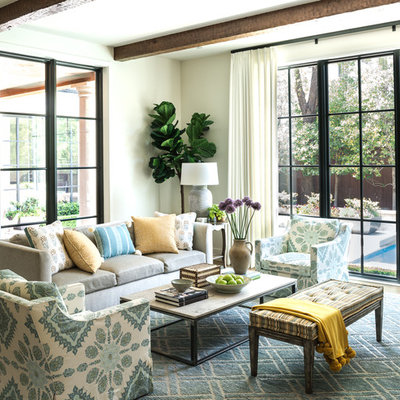 Mid-sized elegant formal and open concept brown floor living room photo in Dallas with white walls, no fireplace and no tv