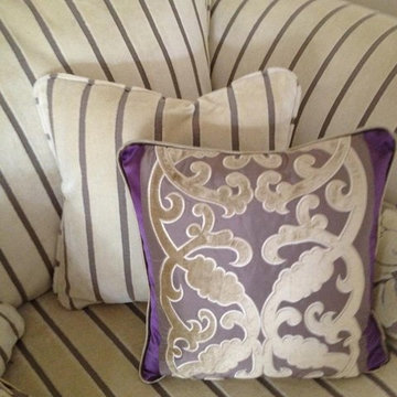 Stripped Sofa with Contrasting Aubergine Cushion