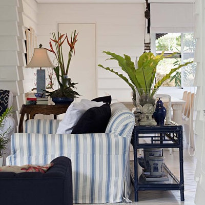 Living room - contemporary living room idea in Other with white walls
