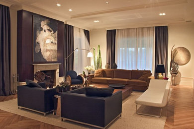 Inspiration for a contemporary living room remodel in Other with beige walls