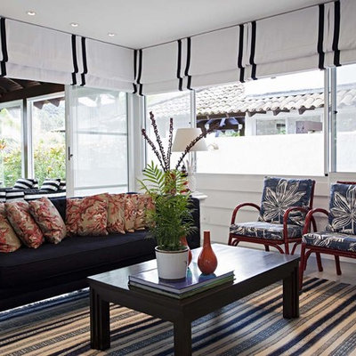 Example of a trendy living room design in Other with white walls