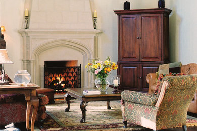 Elegant living room photo in Toronto with beige walls and a standard fireplace