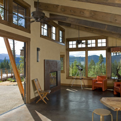 Living room - mid-sized rustic formal and open concept concrete floor living room idea in Seattle with beige walls and no tv