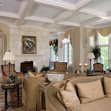 Sunken Living Room with Floor to Ceiling Limestone Surround Fireplace