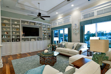 Example of a beach style living room design in Tampa