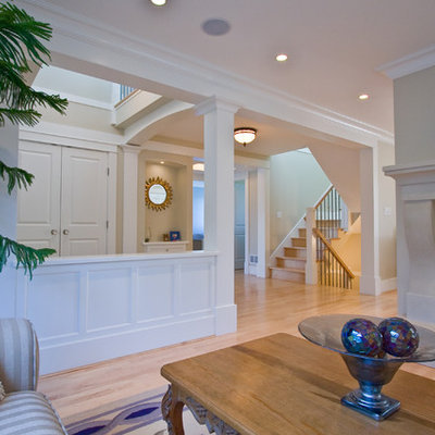 Living room - mid-sized traditional formal and enclosed light wood floor living room idea in Vancouver with beige walls, a standard fireplace, a tile fireplace and no tv