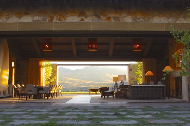 Foto di un ampio soggiorno stile rurale aperto con sala formale, pareti beige, parquet scuro, camino classico, cornice del camino in pietra e nessuna TV