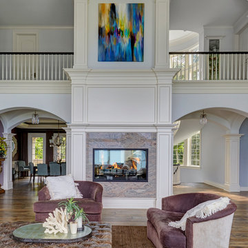 Symmetrical Arched Openings with Central Fireplace