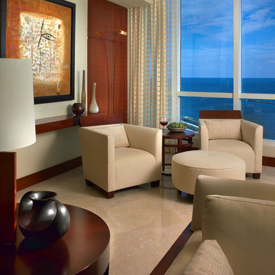 Inspiration for a contemporary living room remodel in Miami with beige walls