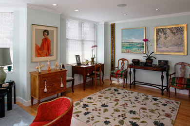 Example of a small classic formal and open concept light wood floor living room design in San Francisco with blue walls