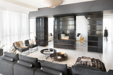Foto di un grande soggiorno minimalista aperto con pareti bianche e pavimento grigio