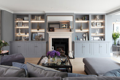 Design ideas for a large traditional formal living room in London with grey walls.