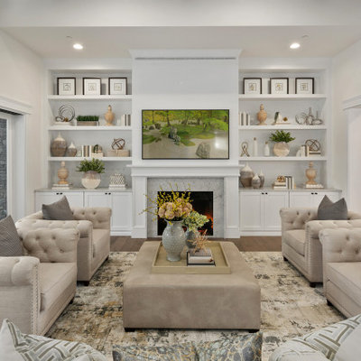 Large transitional open concept medium tone wood floor and brown floor living room photo in Seattle with white walls, a wall-mounted tv, a standard fireplace and a tile fireplace