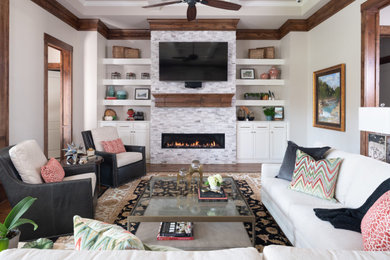 Inspiration for a large transitional open concept dark wood floor and brown floor living room remodel in Dallas with white walls, a ribbon fireplace, a tile fireplace and a wall-mounted tv