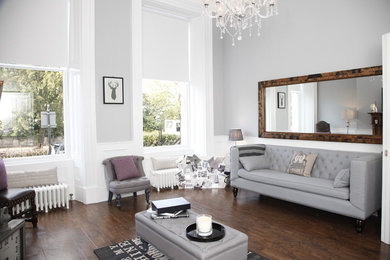 This is an example of a medium sized modern living room in Edinburgh.