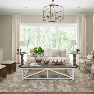 Living room - mid-sized traditional formal and open concept dark wood floor and brown floor living room idea in Jacksonville with beige walls, a standard fireplace and a tile fireplace