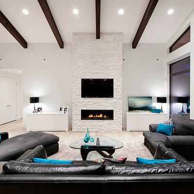 Inspiration for a contemporary living room remodel in Vancouver with white walls, a ribbon fireplace and a wall-mounted tv