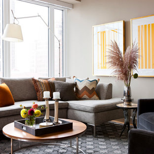 Example of a large minimalist open concept light wood floor living room design in Boston with brown walls