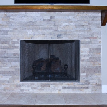 The finished surround and hearth complement the recovered wood mantle