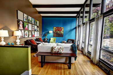 Mid-century modern living room photo in Grand Rapids