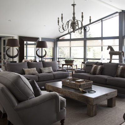 Living room - huge contemporary open concept dark wood floor and brown floor living room idea in Montreal with white walls and a wall-mounted tv