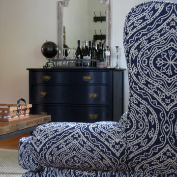 The medallion fabric on the wingback inspired the room's color scheme.