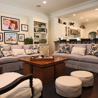 Example of a trendy open concept living room design in Los Angeles with white walls