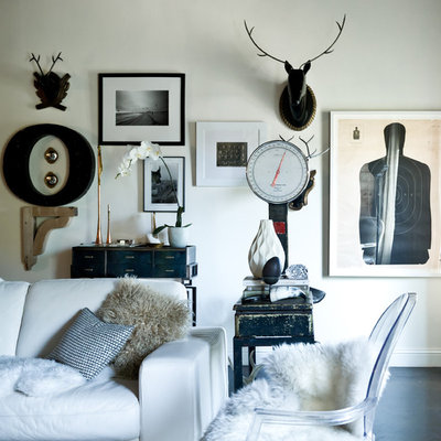 Living room - eclectic living room idea in Dallas with white walls
