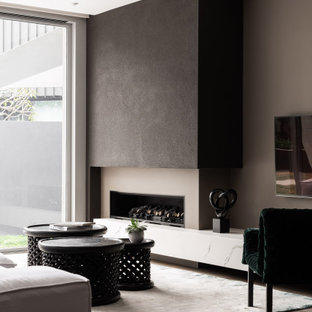 Contemporary formal open concept living room in Perth with brown walls, medium hardwood floors, a ribbon fireplace, a wall-mounted tv and brown floor.