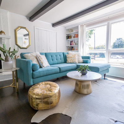 Example of a transitional formal and enclosed dark wood floor and brown floor living room design in Nashville with white walls and a standard fireplace