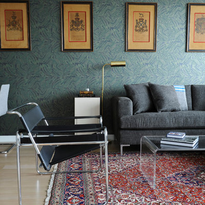 Eclectic light wood floor living room photo in Vancouver with blue walls