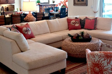 Example of a mid-sized beach style open concept travertine floor living room design in Orlando with white walls