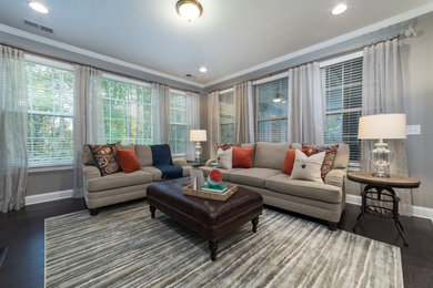 Example of a transitional living room design in Raleigh
