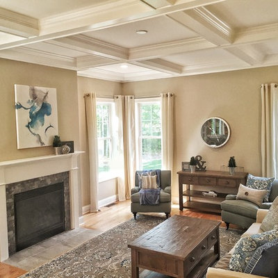 Inspiration for a mid-sized transitional formal and open concept medium tone wood floor living room remodel in Providence with gray walls, a standard fireplace and a tile fireplace