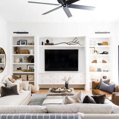 Example of a farmhouse living room design in Phoenix