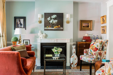 Inspiration for a traditional living room in Boston with blue walls.