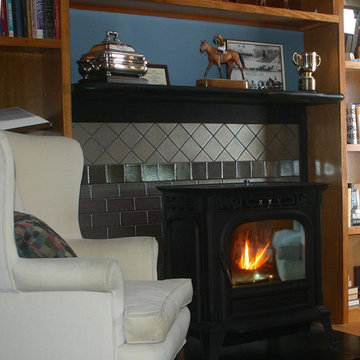 Tile design behind wood stove uses recycled materials