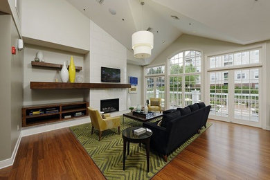 Contemporary living room in Brisbane with medium hardwood flooring.