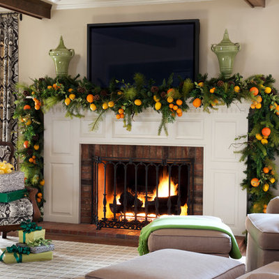 Example of a classic living room design in Little Rock with beige walls and a standard fireplace