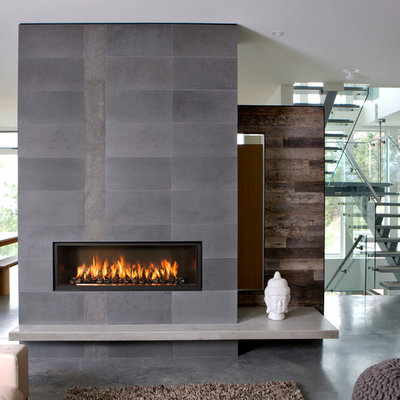Trendy open concept concrete floor living room photo in Sacramento with a ribbon fireplace