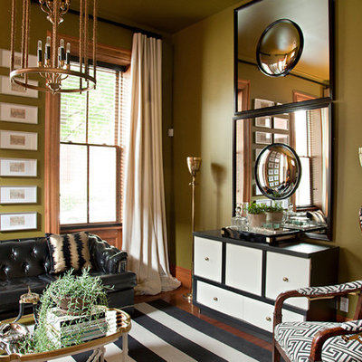 Inspiration for a small contemporary formal and open concept medium tone wood floor living room remodel in St Louis with green walls, no fireplace and no tv