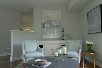 Example of a small classic formal and open concept dark wood floor and brown floor living room design in Toronto with blue walls and no tv