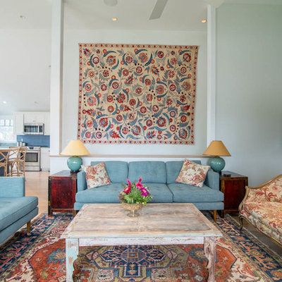 Elegant dark wood floor living room photo in Portland Maine with blue walls